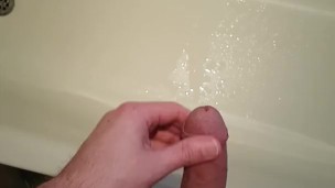 Pissing then a huge cumshot