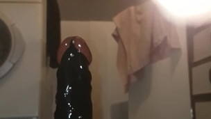 riding black dildo anal fuck