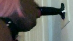 Kyla Throatz sucking dildo