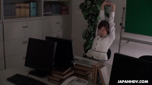 Office worker getting some juice up as her work gets boring