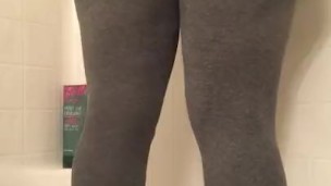Pissing in my yoga pants and showing off my tits