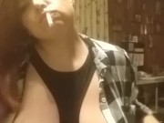 Sexy redhead smoking with tits out fetish play 3/16