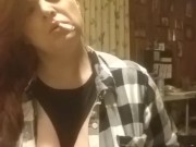 Sexy redhead smoking with tits out fetish play 4/16