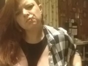 Sexy redhead smoking with tits out fetish play 7/16