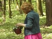 Milf of PornHub in mini dress without panties collects flowers. Spring. 13/16