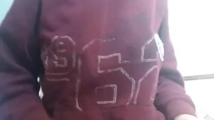 Girl with big jiggly boobs taking her shirt off