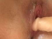 Teen uses dildo