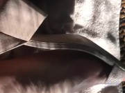 Feet in heels and rubbing on lotion