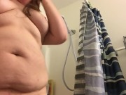 Chubby teen gets ready to take a shower