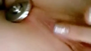 Tight ass stuffed with butt plug and vibrator on a wet cunt