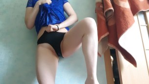 girl in a dress pissing