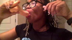 Tranny sucks a 5 inch dildo