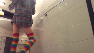 nerdy hipster transgirl covering herself in lube