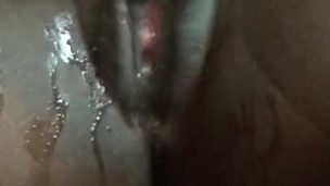 Black Girl plays with pussy and Squirts