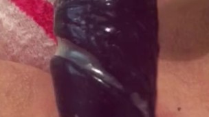 Gentle mastebating with huge dildo