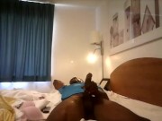 Masturbating