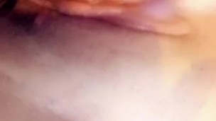 Brunette girl plays with juicy pussy