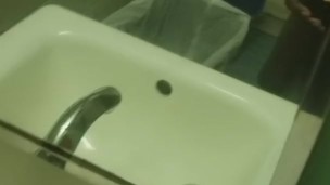 Cumming in the bathroom on the clock