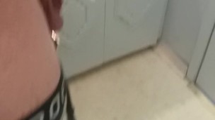 Jerking cock in bathroom