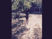 Sexy girl with a huge booty bouncing it at the beach 1/16