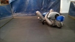 crocodile zentai struggles against masked dummy wrestler