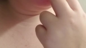 Horny girl sucking finger