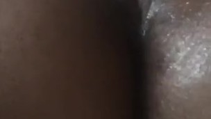Ebony BBW removing large butt plug from arse. Damn.