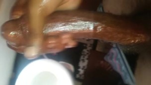 Big black dick oiled up