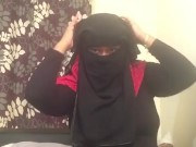 Lonely Niqabi Hijabi woman sucking dildo & shaking ass
