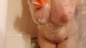 Chubby girl takes a hot soapy shower