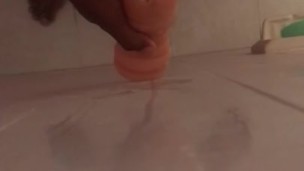 Thick black dick has a quickie with toy