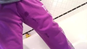 Pissing in my purple sweatpants for you.