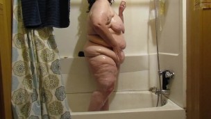 Taking a shower.
