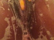 Sexy ebony playing with herself in the shower