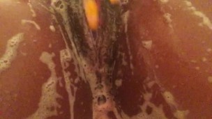 Sexy ebony playing with herself in the shower