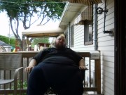 Fat men sitting outside happy 13/16