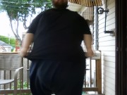 Fat men sitting outside happy 15/16