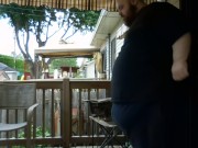 Fat men sitting outside happy 2/16