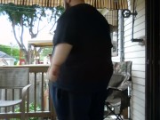 Fat men sitting outside happy 3/16