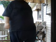 Fat men sitting outside happy 5/16