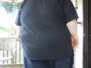 Fat men sitting outside happy 6/16