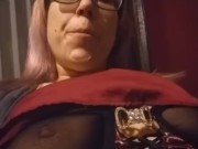 Girl in Glasses Playing with Big Boobs while Blowing Smoke