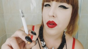CIGARETTE DANGLING AND SMOKING CLOSE UP WITH RED LIPS