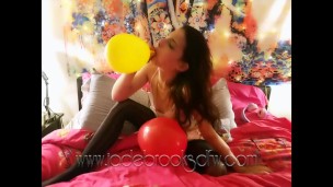 Sexy Brunette Blowing Balloons in Bed Wearing Thigh High Stockings FULLCLIP