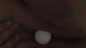 Ping pong balls pushed out of pussy