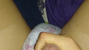 boy in diapers and a dress.
