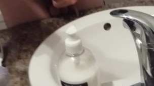 guy masterbates in bathroom