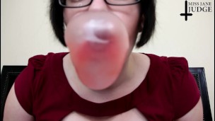 Bubble gum babe blows big bubbles