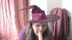 Halloween witch sucking a dildo