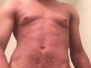Masturbating